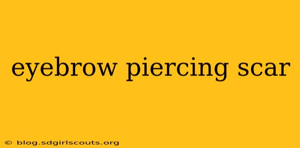 eyebrow piercing scar
